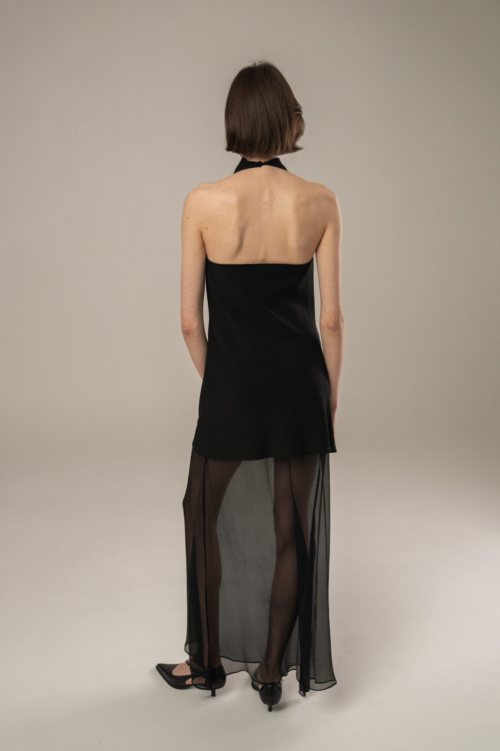 TYLA long black dress with a sheer silk chiffon hem and a halter neckline - Image 3