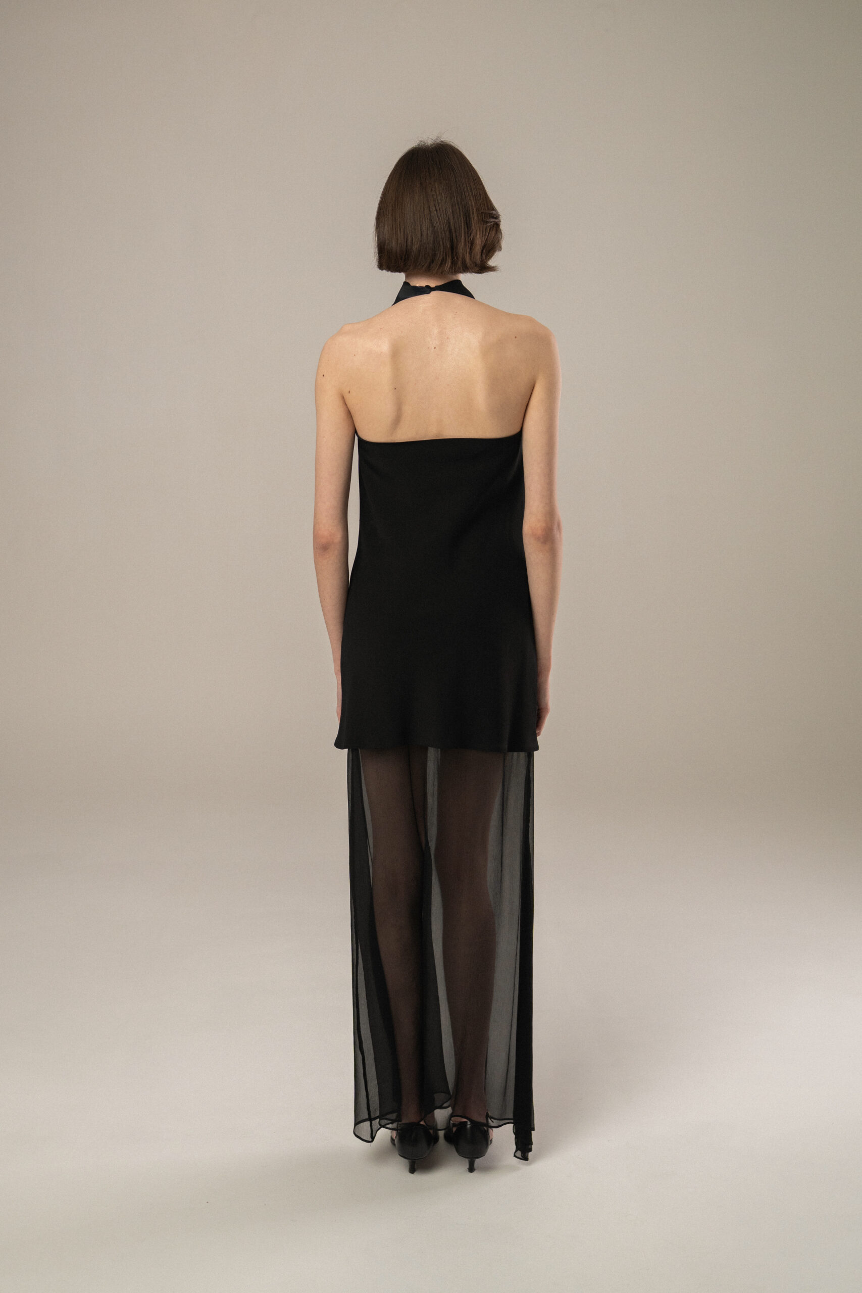 TYLA long black dress with a sheer silk chiffon hem and a halter neckline - Image 4