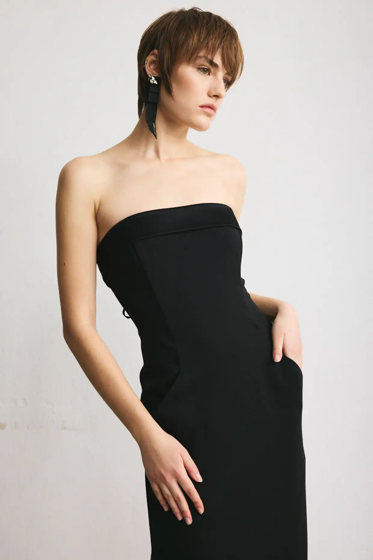 Long black corset dress with pockets