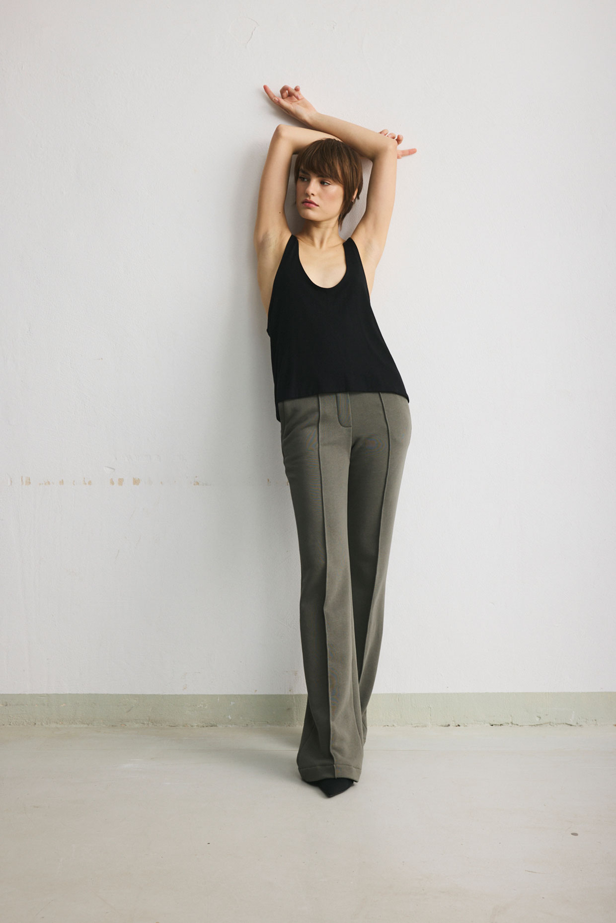 Black viscose top with sharply cut armholes. - Image 3