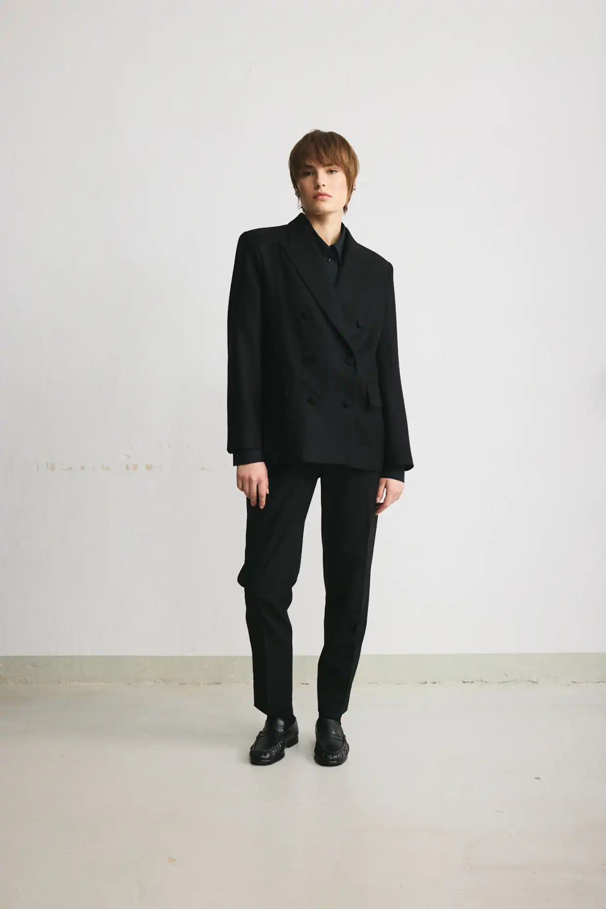 Black double-breasted wool blazer in a boxy fit