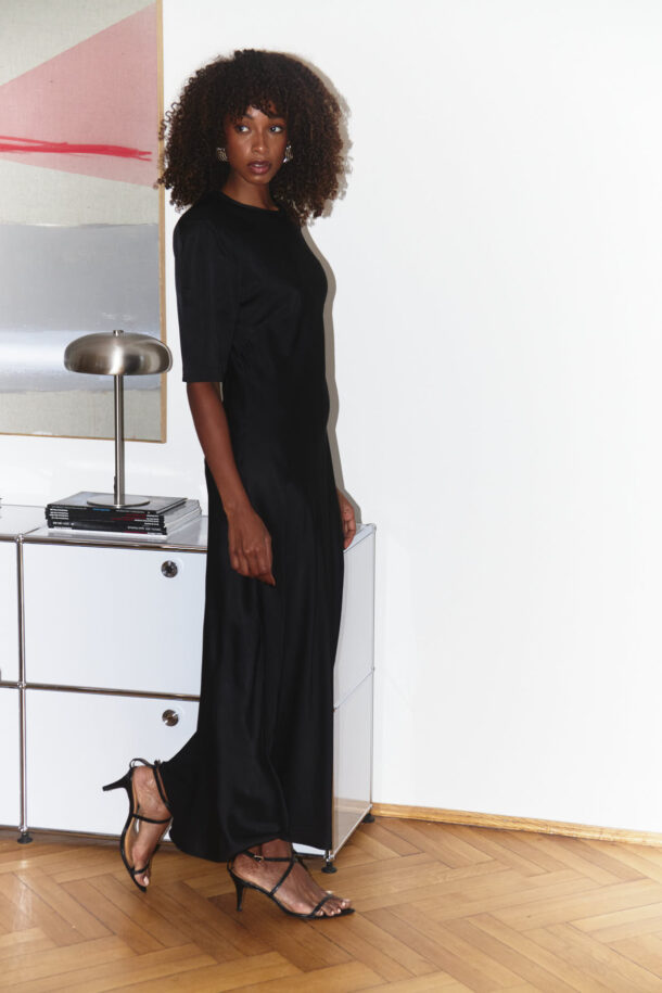SIRA long black satin dress with shoulder pads and short sleeves